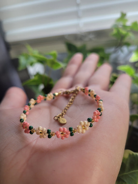 Stainless steel glass beaded flower bracelet.