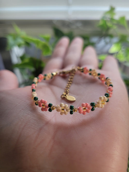 Stainless steel glass beaded flower bracelet.