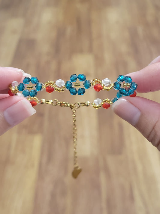 Stainless steel glass beaded bracelet.